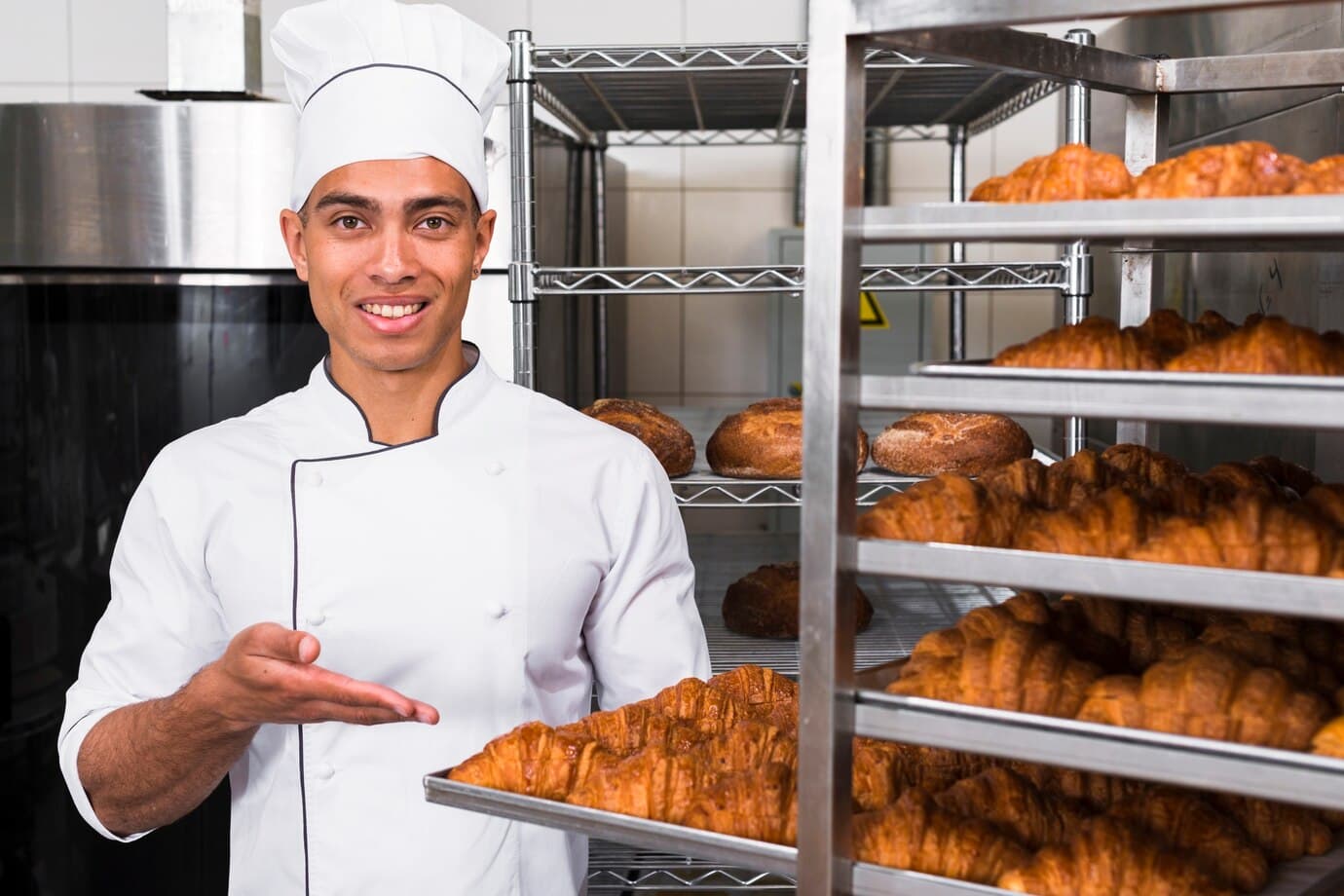 Young man with croissants